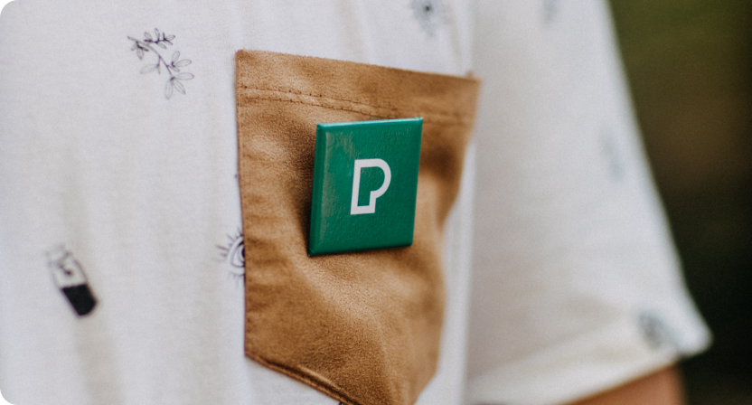 Branded badge on the pocket of a private-label garment